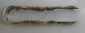 Austrian antique silver sugar tongs with masks and floral motifs