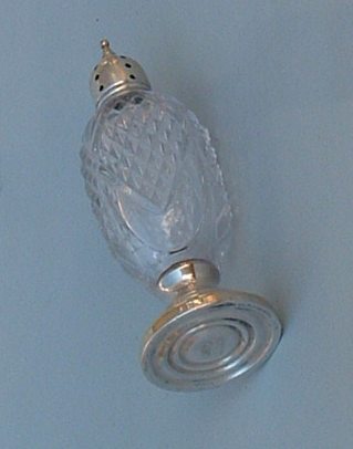 silver and cut glass salt and peppershakers