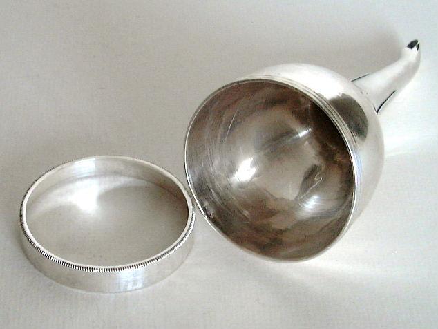 removable inner ring retaining a muslin straining cloth removable inner ring retaining a muslin straining cloth