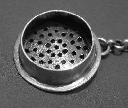 pierced strainer with small chain pierced strainer with small chain