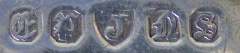 J inside a shield unidentified