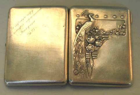 Russian silver cigarette case chasing with peacock, wreaths of flowers and fruits Russian silver cigarette case chasing with peacock, wreaths of flowers and fruits