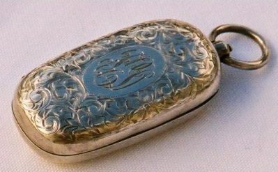 a silver coin holder sovereign holder from a small collection of